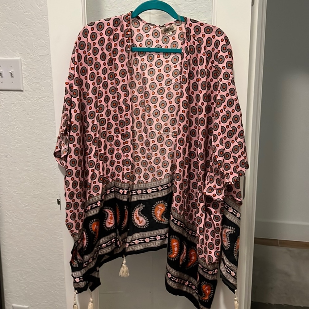Boho Chic! Such a cool top! Just drape it over your shoulders!